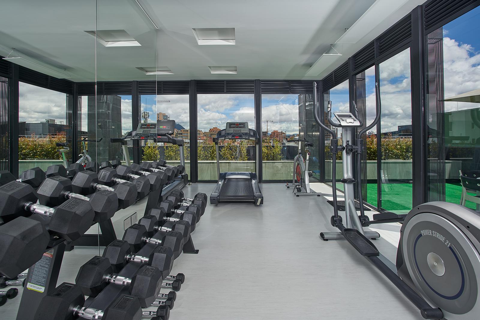Hotel 100 Luxury Suites By Preferred Богота Экстерьер фото The gym at the top of the building